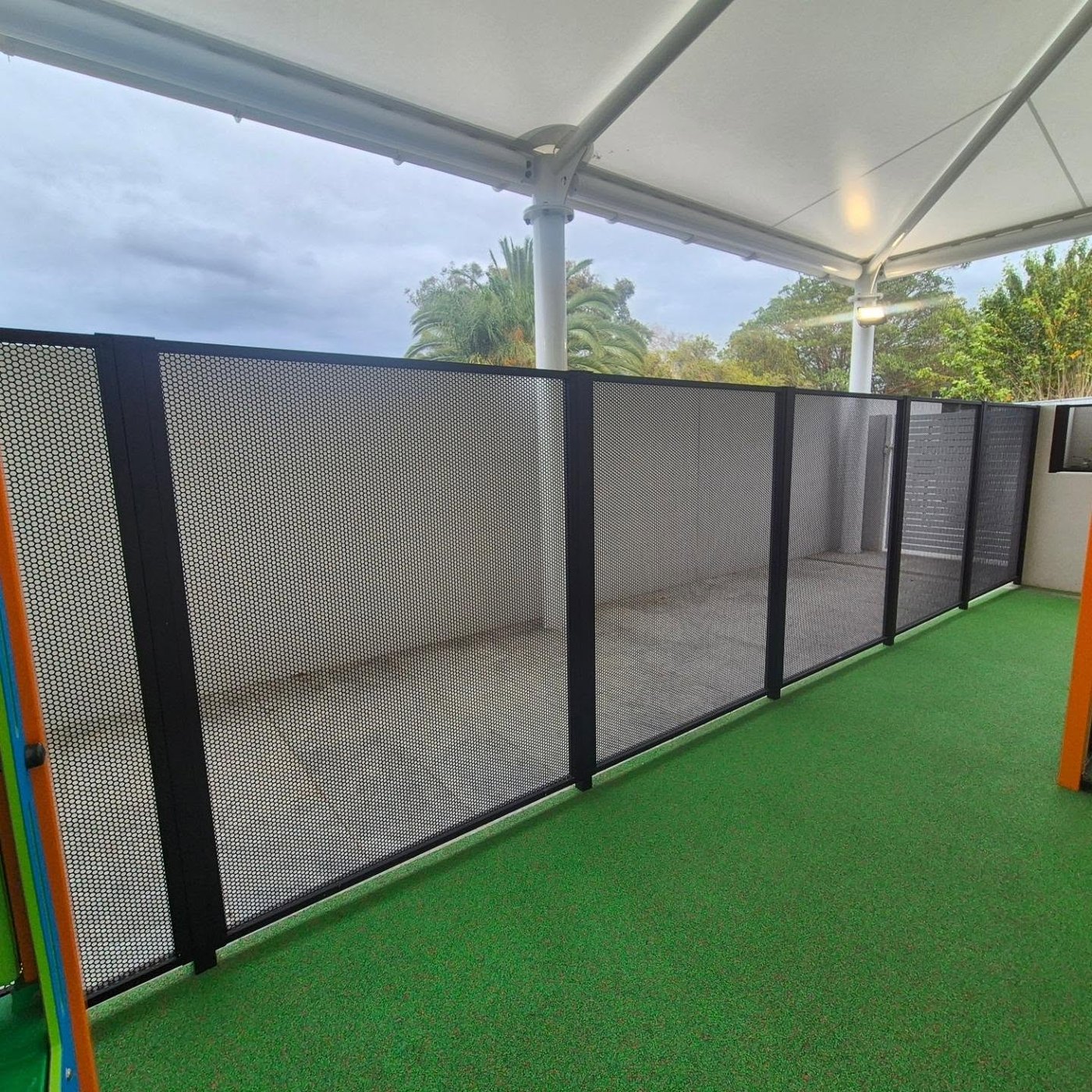 Real Perf Safe perforated aluminium fence around a childcare centre play area